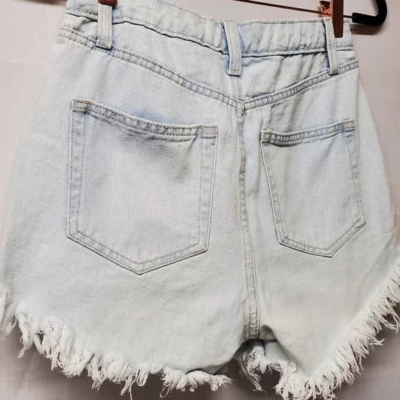 Highest-Rise Light Wash Button Fly Shorts - Picture 5 of 11